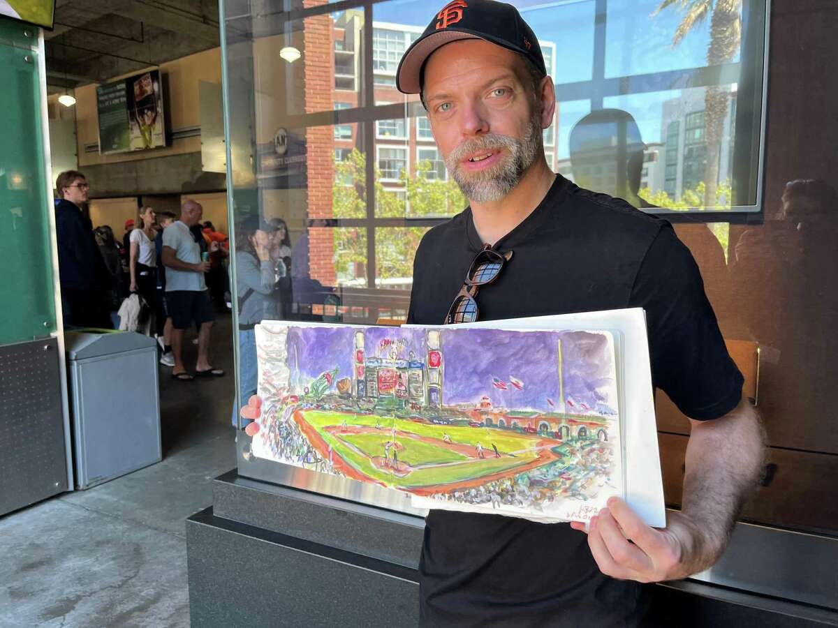 Andy Brown of Chelmsford, England, has made paintings at more than 100 baseball stadiums around the world.