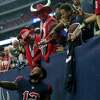 Houston Texans wide receiver Nico Collins (12) takes a selfie with a fan’s phone as he celebrates the Texans 41-29 win over the Los Angeles Chargers Sunday, Dec. 26, 2021 in Houston.