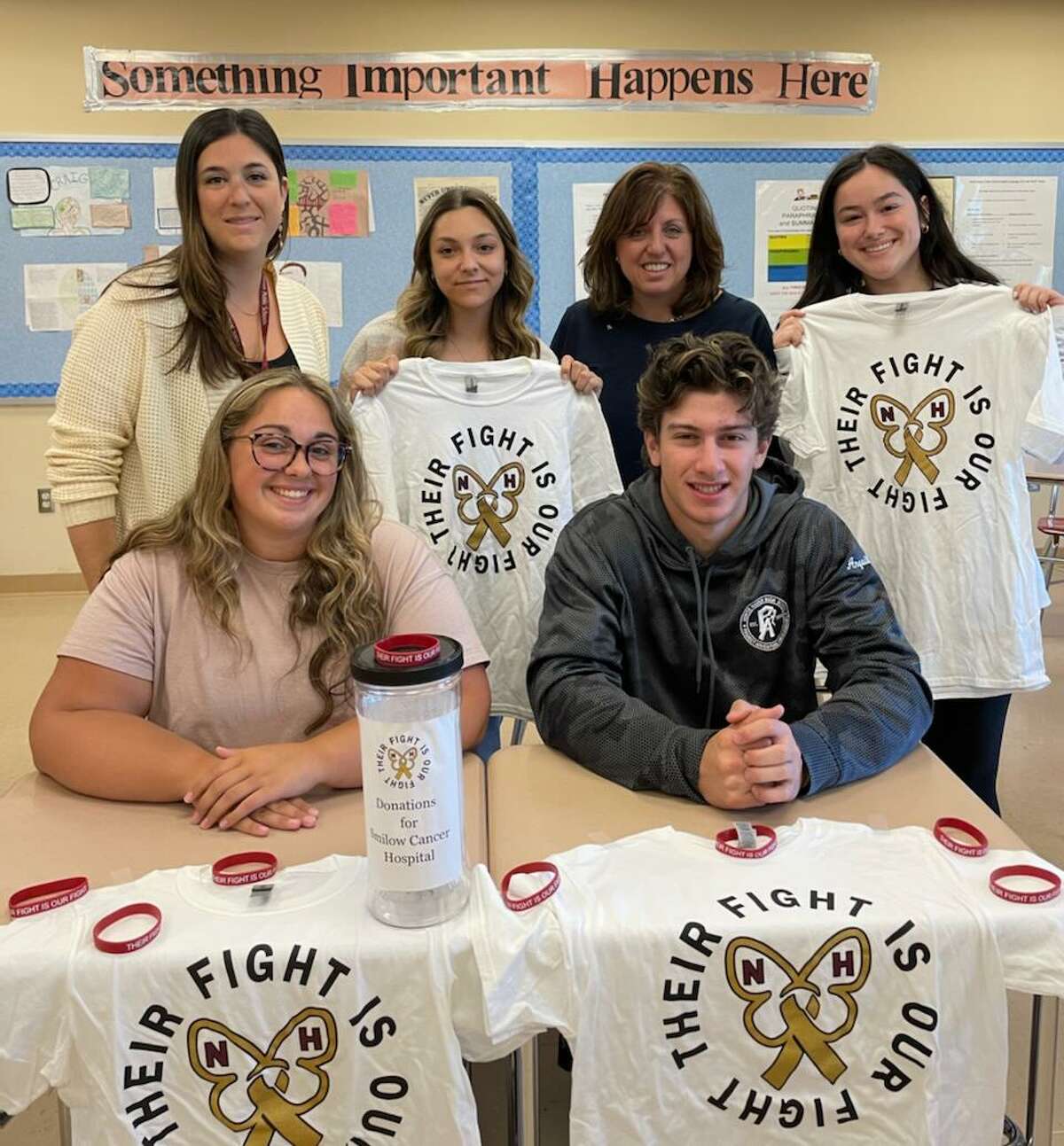 These North Haven High School students and staff raised $2,000 toward a fund to supply young patients at Smilow Cancer Hospital with craft supplies. The fund is in memory of Brenna Zettergren, who lost her battle with cancer at age 5. Front row are: Rebecca Anastasio, Michael Anquillare; back row are: National Honor Society co-adviser Carla DeStefanis, student Juliana Mascia, NHS co-adviser Jennifer Zettergren, Brenna’s mother, and student Eliza O’Connor.