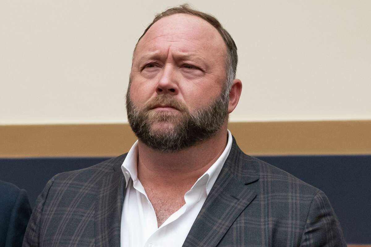 FILE - This Tuesday, Dec. 11, 2018, file photo shows radio show host and conspiracy theorist Alex Jones at Capitol Hill in Washington. (AP Photo/J. Scott Applewhite, File)