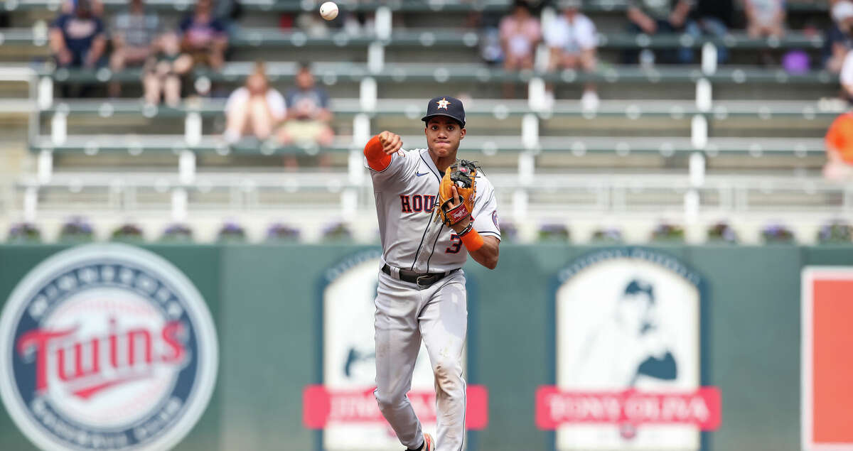 Jeremy Pena #3 of the Houston Astros throws the ball to first base to get out Jose Miranda #64 of the Minnesota Twins in the ninth inning of game one of a doubleheader at Target Field on May 12, 2022 in Minneapolis, Minnesota. The Astros defeated the Twins 11-3. (Photo by David Berding/Getty Images)