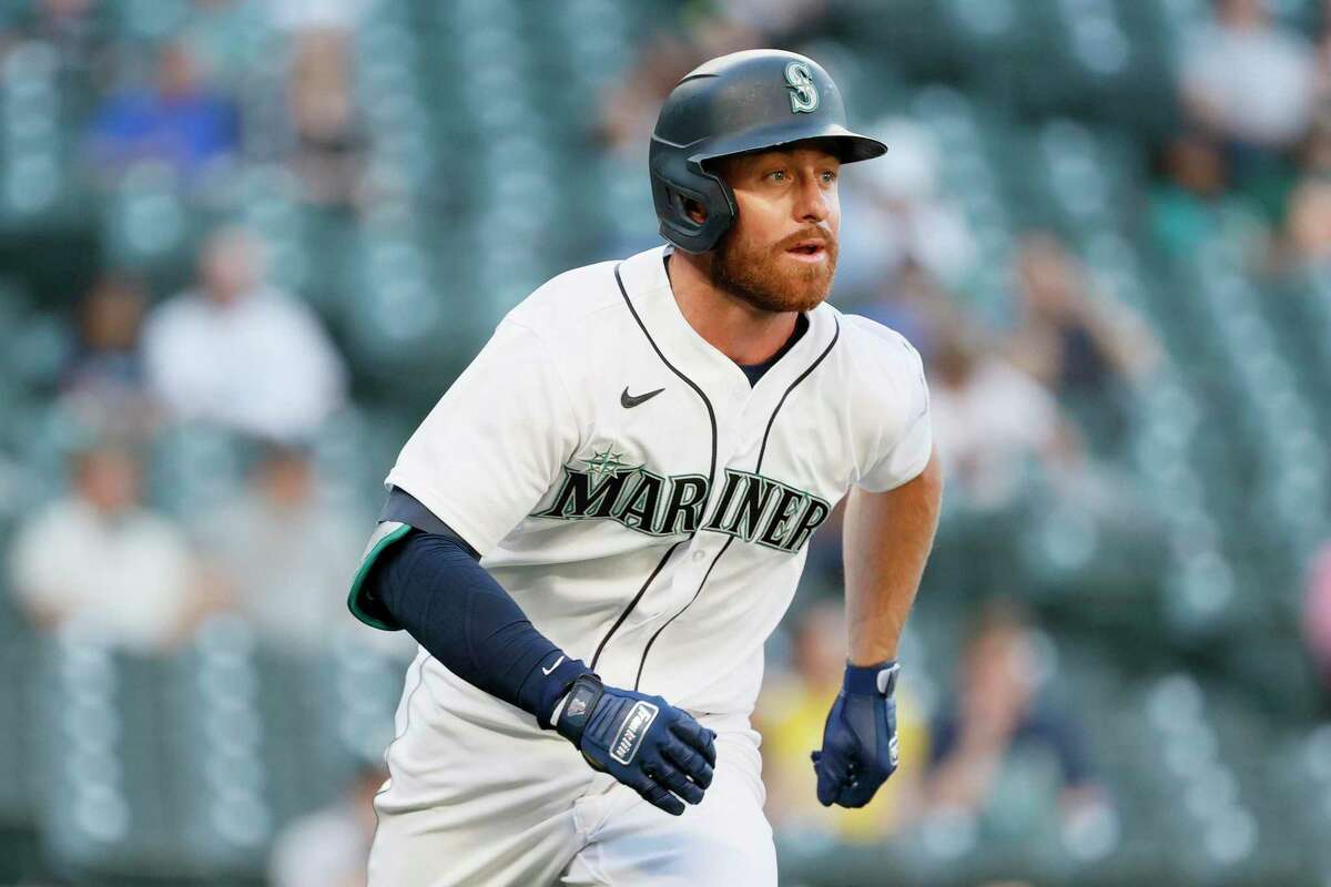 SEATTLE, WASHINGTON - JUNE 01: Donovan Walton #31 of the Seattle Mariners runs to first base against the Oakland Athletics at T-Mobile Park on June 01, 2021 in Seattle, Washington. (Photo by Steph Chambers/Getty Images)