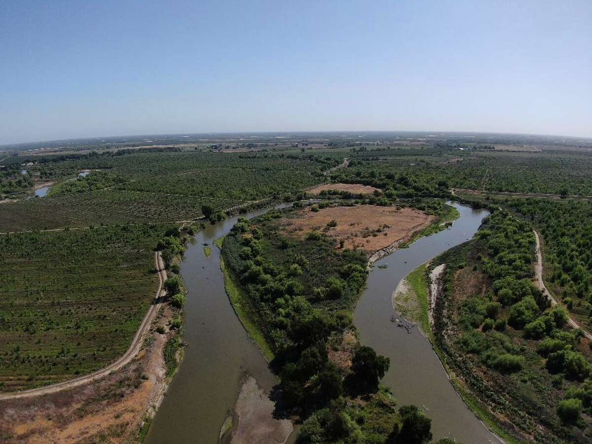 The San Joaquin river winds through the Dos Rios Ranch on Friday, May 7, 2021 in Modesto, Calif.