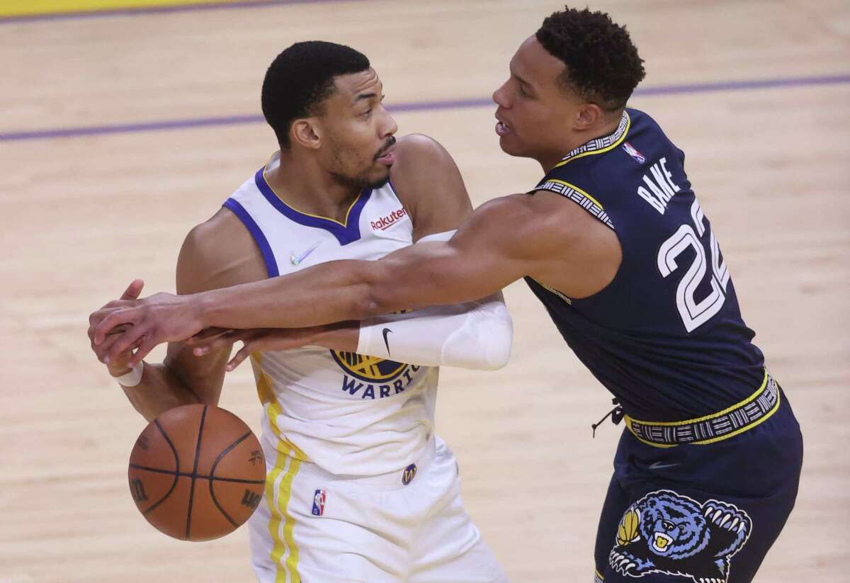Golden State Warriors’ Otto Porter, Jr. has the ball stolen by Memphis Grizzlies’ Desmond Bane in 1st quarter during Game 4 of NBA Western Conference Semifinals at Chase Center in San Francisco, Calif., on Monday, May 9, 2022.