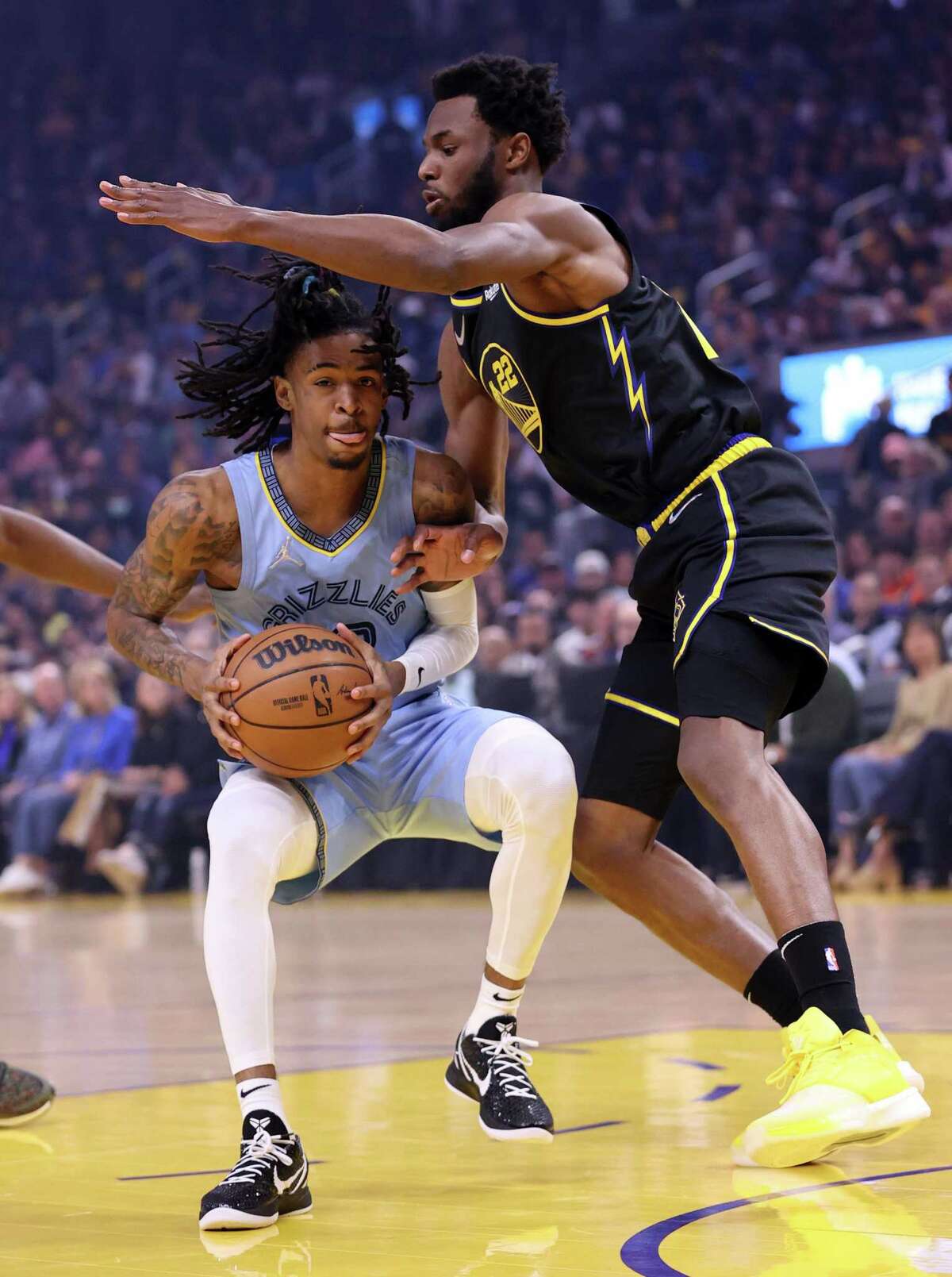 The Warriors have asked for more defense from Andrew Wiggins, here guarding Grizzlies guard Ja Morant in Game 3.