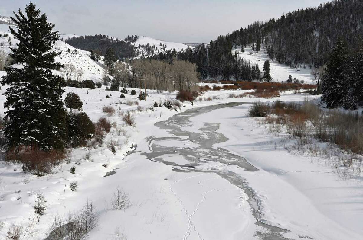 An icy Colorado River in February in Grand County, Colo. The winter snowpack is crucial for the river and the millions that depend on it as their water supply.