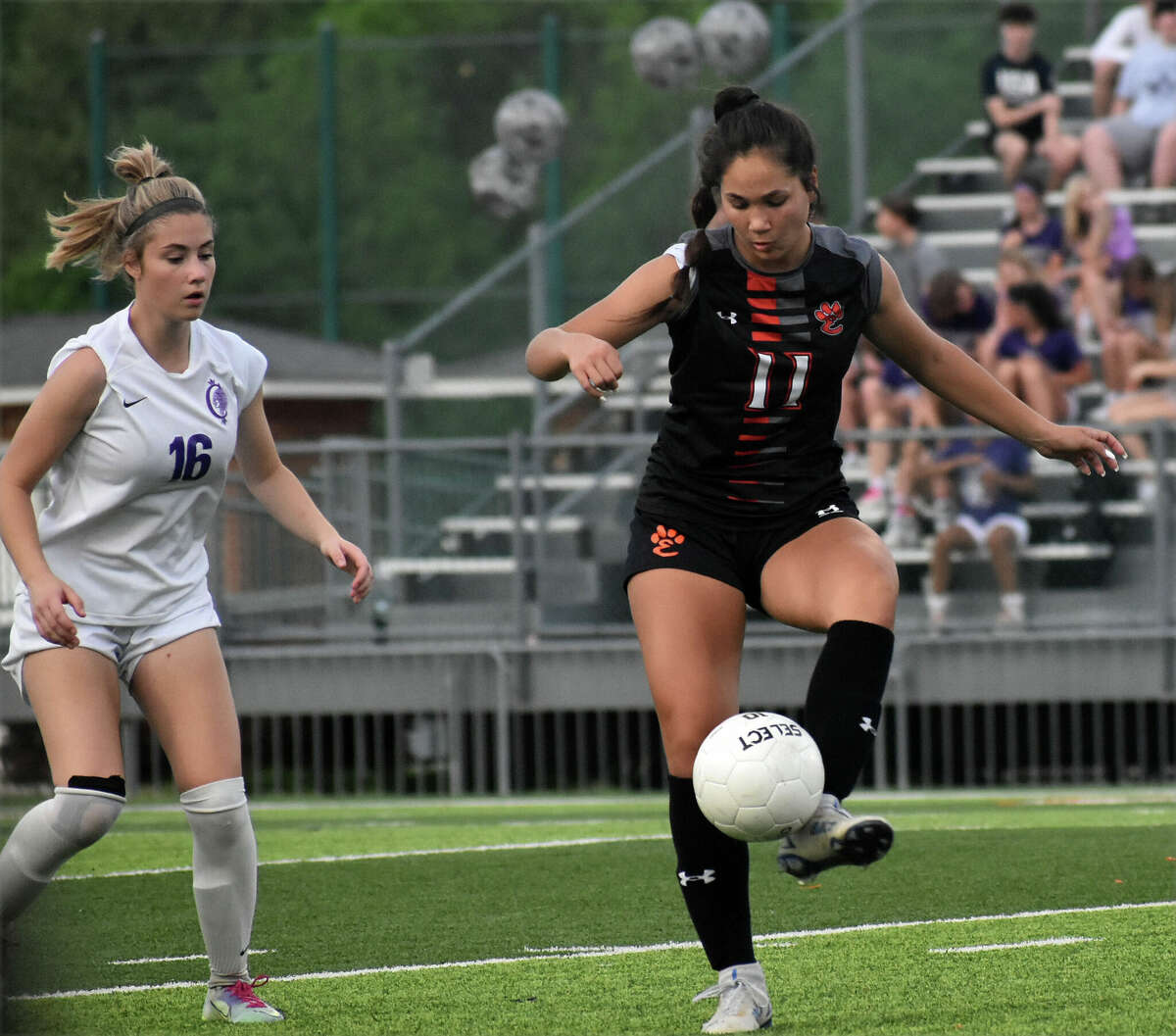 Edwardsville's Olivia Baca settles the ball against Collinsville on Friday inside the District 7 Sports Complex in Edwardsville.
