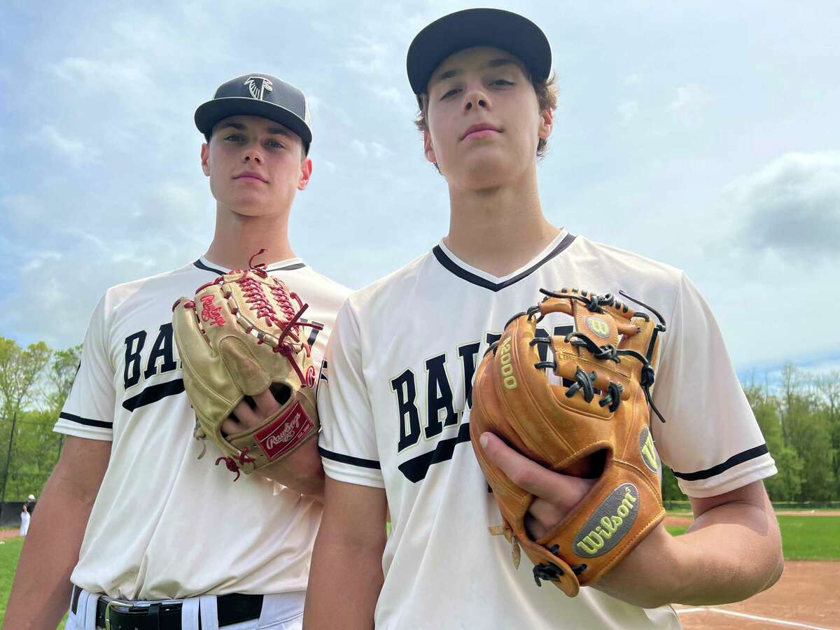 Joel Barlow baseball players Matt Scott and Will Scott pose Saturday at Barlow High in Redding. Falcons coach Matt Griffiths said “As much as Matt is the beating heart of our pitching staff, Will is the beating heart of our offense.”