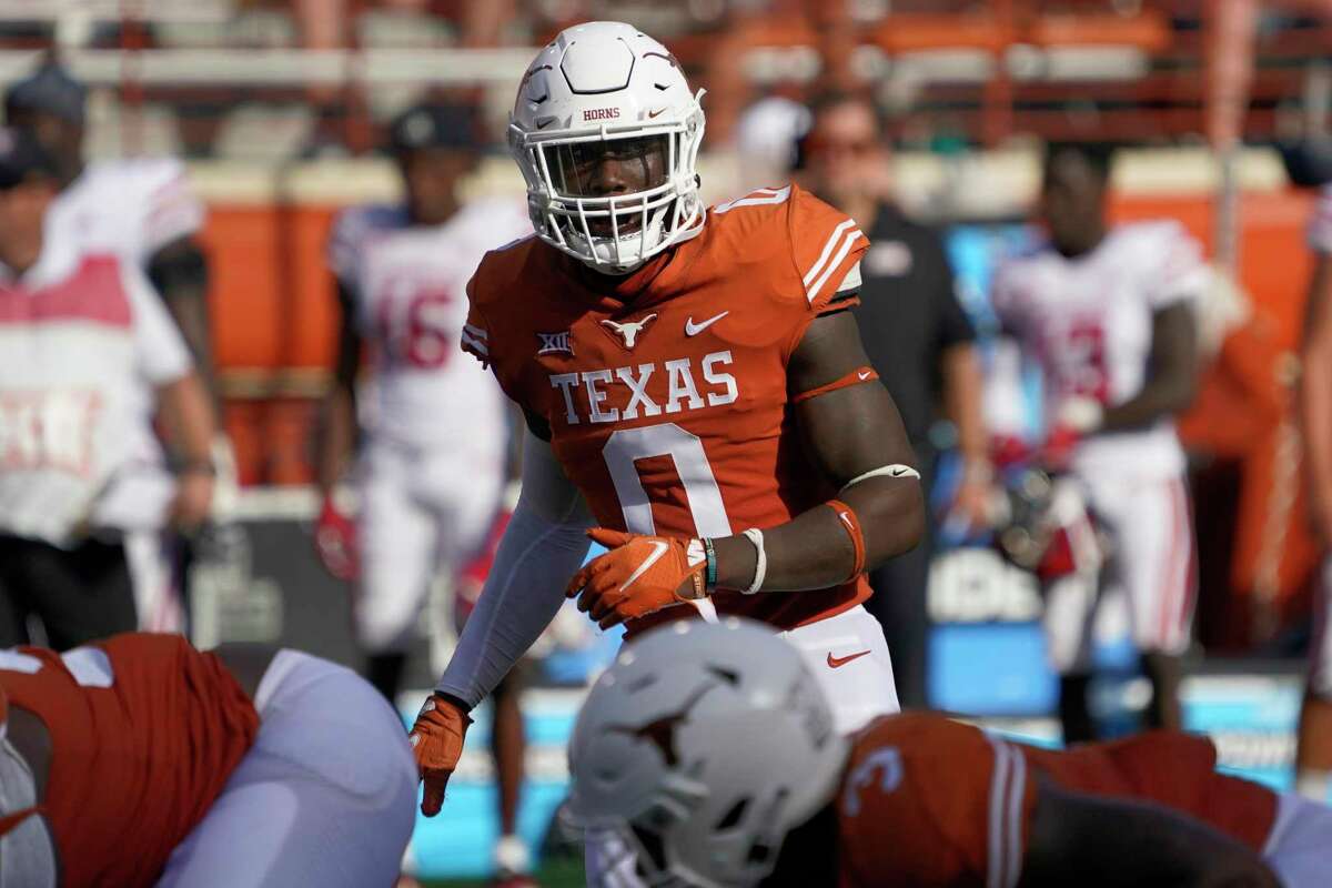 Texas’ DeMarvion Overshown (0) defends against Louisiana-Lafayette during the second half on Saturday, Sept. 4, 2021, in Austin.