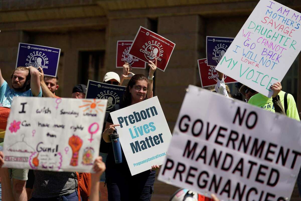 Abortion rights demonstrators try to block anti-abortion demonstrators at the Texas Capitol, Saturday, May 14, 2022, in Austin, Texas. Demonstrators are rallying from coast to coast in the face of an anticipated Supreme Court decision that could overturn women’s right to an abortion. More (AP Photo/Eric Gay)