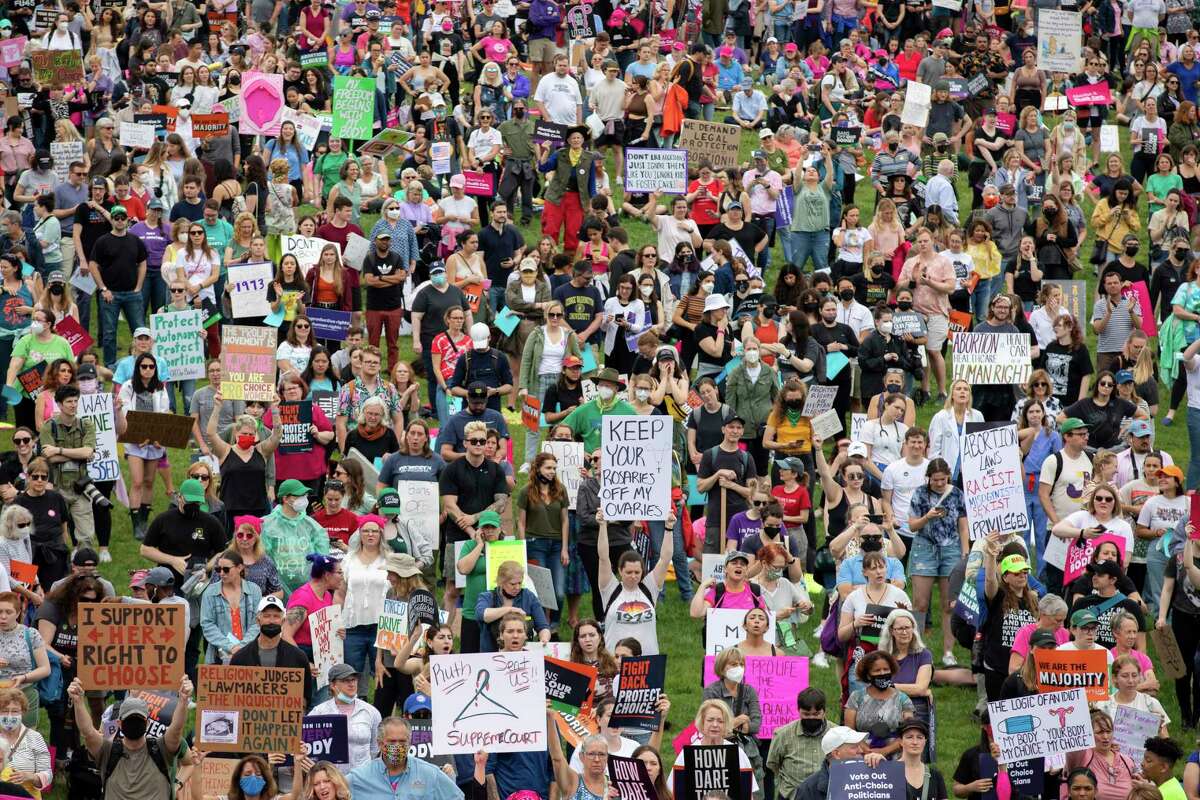 Abortion rights demonstrators rally, Saturday, May 14, 2022, on the National Mall in Washington. Demonstrators are rallying from coast to coast in the face of an anticipated Supreme Court decision that could overturn women’s right to an abortion.