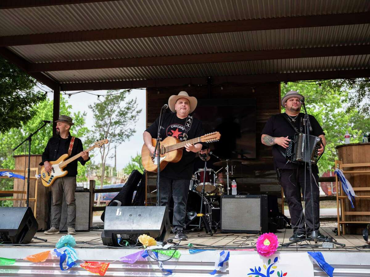 Los Texmaniacs perform during a celebration of books event in Fredericksburg, on Saturday, May 14, 2022. Recently Fredericksburg ISD removed books from their library shelves for various content which opponents say is paramount to banning authors’ voices from their children at school.