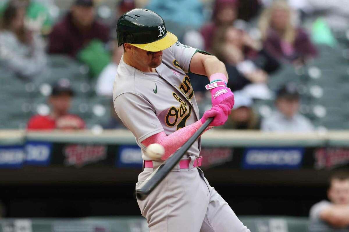 Oakland Athletics' Chad Pinder strikes out during the ninth inning of a baseball game against the Oakland Athletics, Sunday, May 8, 2022, in Minneapolis. (AP Photo/Stacy Bengs)