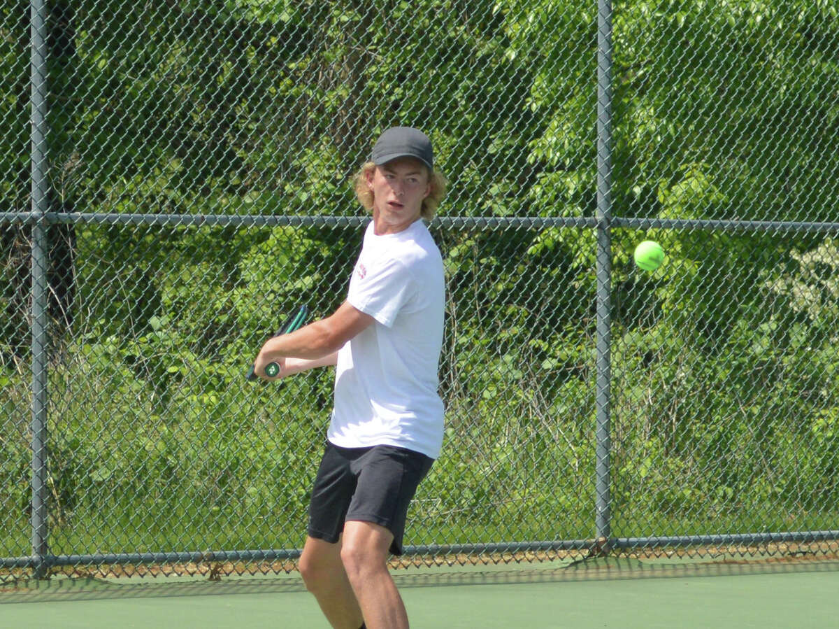 Colton Hulme at the Southwestern Conference tournament on Saturday at the Andy Simpson Tennis Complex on the campus of Lewis and Clark Community College.