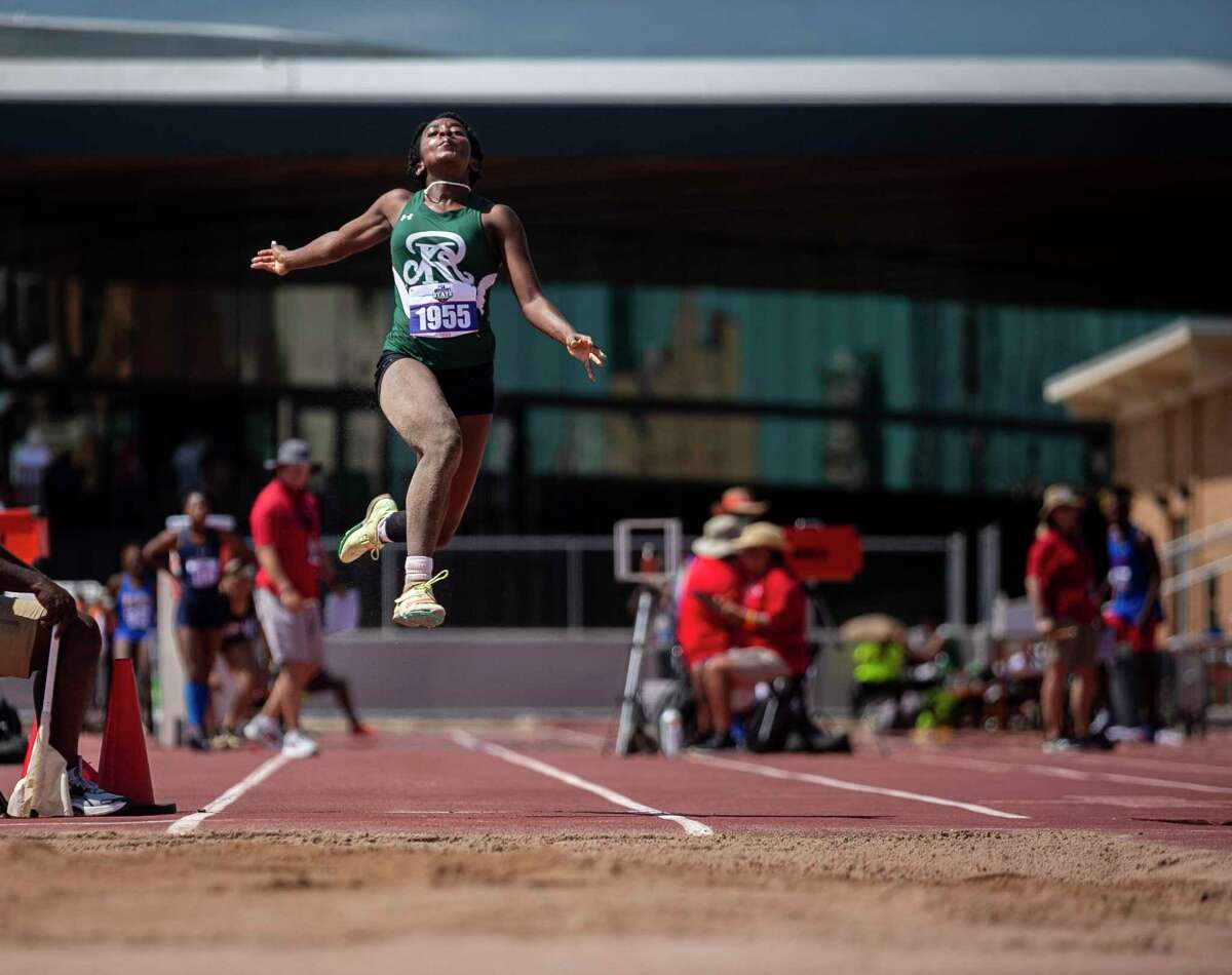 Reagan’s Taylen Wise flies through the air as she competes in the long jump event during the UIL State Track and Field Championship at Mike A. Myers Stadium in Austin, Texas, on May 14, 2022.