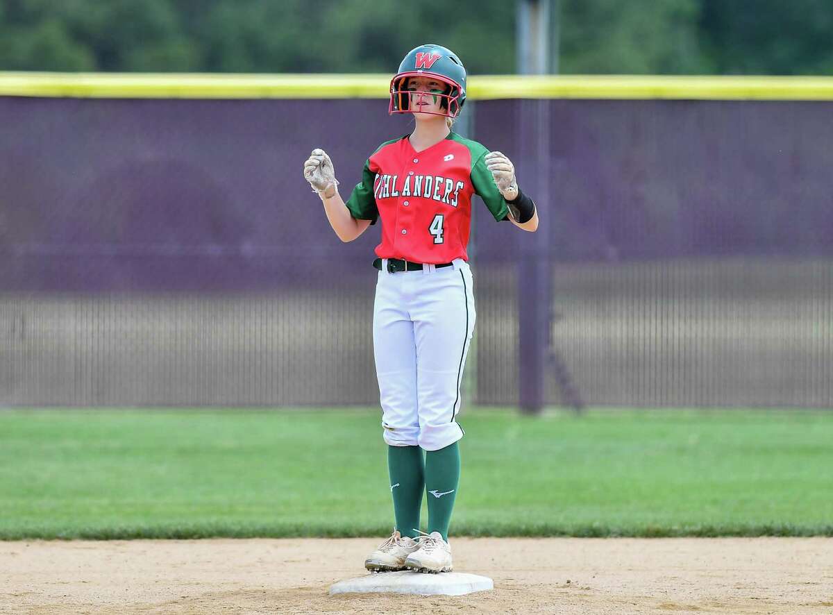 Woodlands Avery Vasel (4) hits a standup double scoring two runs in the first inning during a Region II-6A quarterfinals softball game at Magnolia High School on Saturday, May 14, 2022. Woodlands beat Grand Oaks 14-11 in 7 innings.