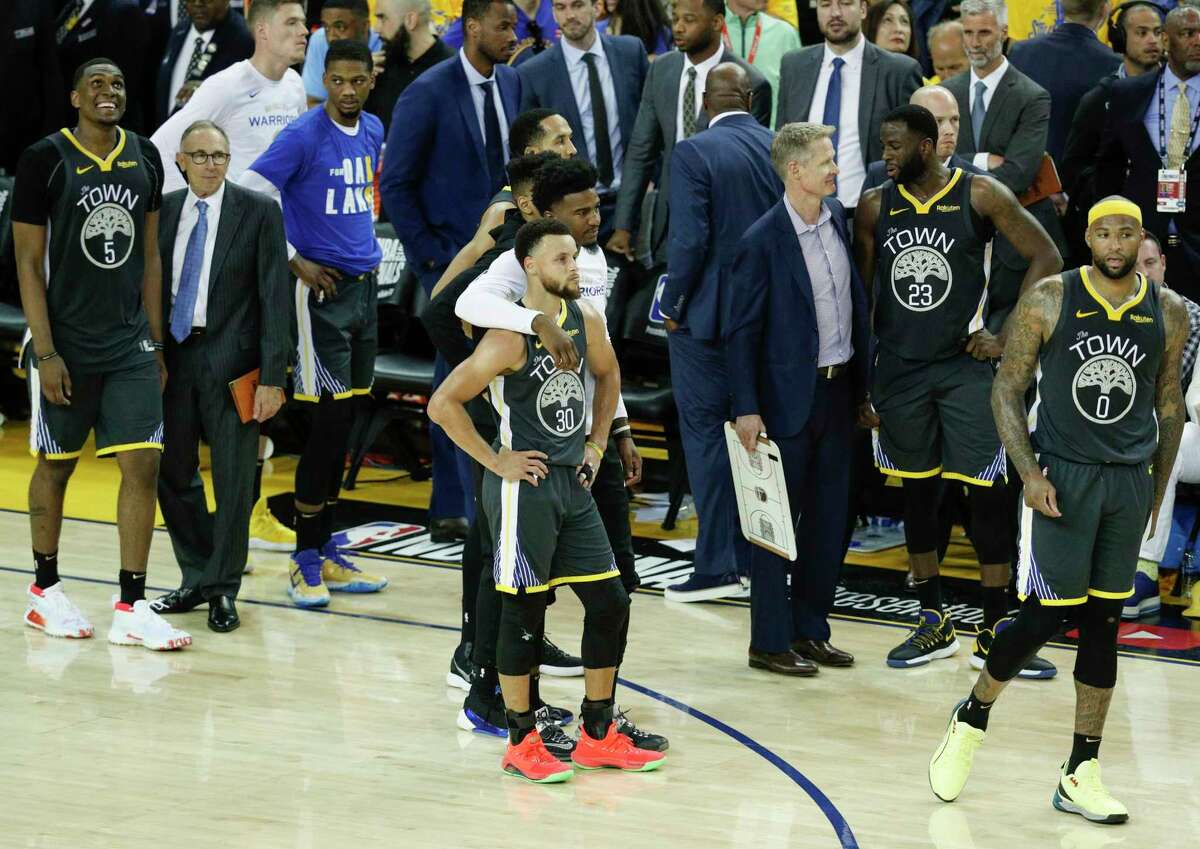 The Warriors look on in the final seconds of the NBA Finals Game 6 on June 13, 2019, at Oracle Arena in Oakland. Golden State lost to the Toronto Raptors, who won their first league championship.