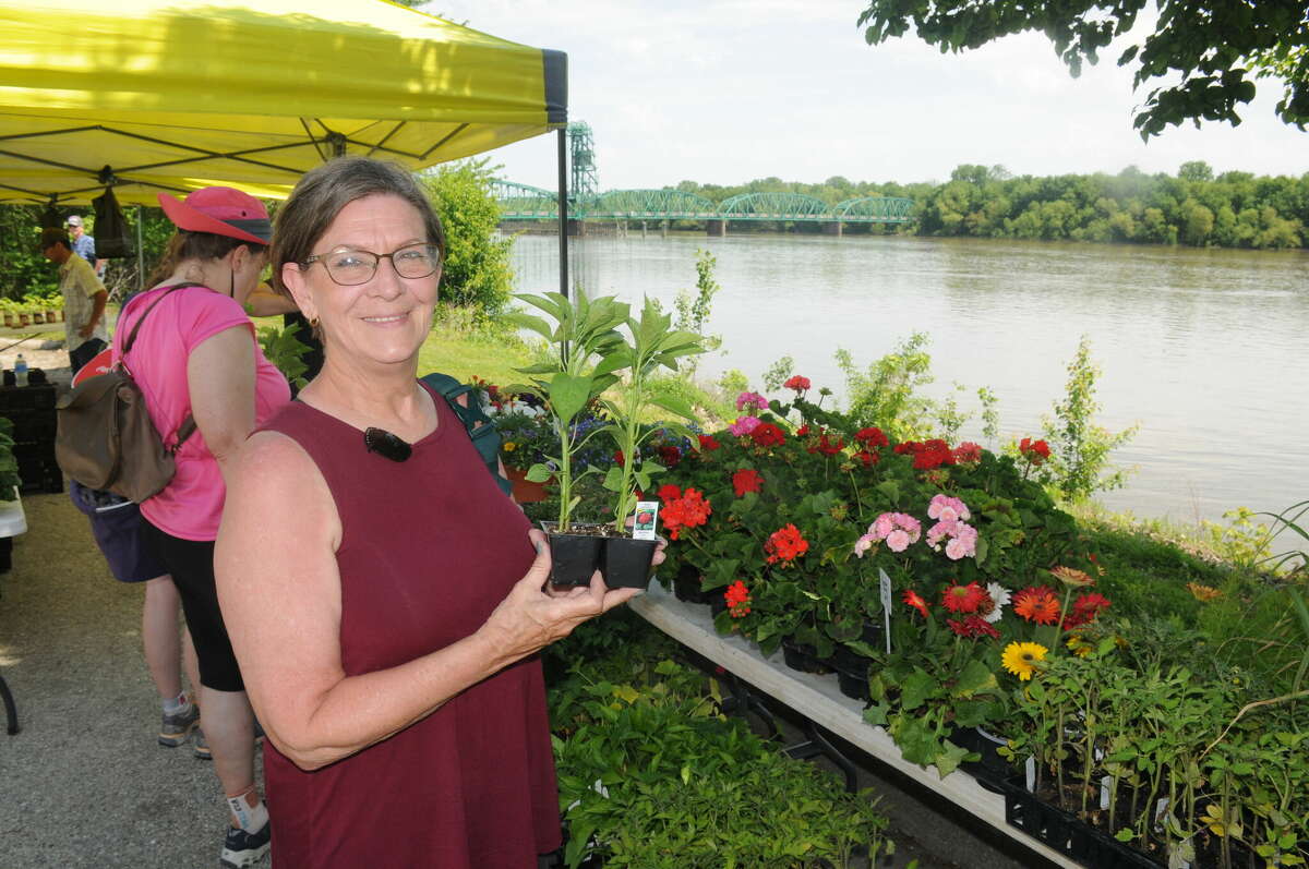 Steph Bush of Bunker hill found the pepper plants to her liking on Saturday during the Garden and Flower Expo in Hardin.