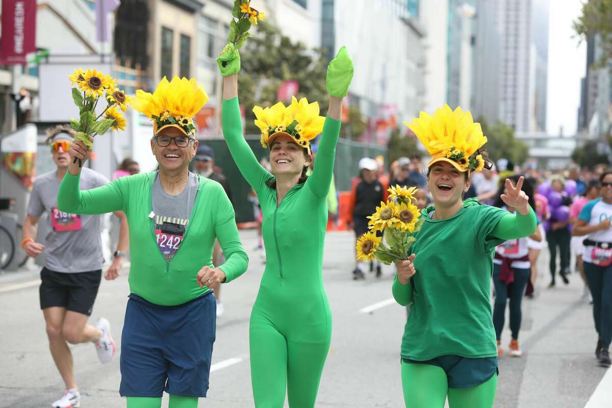 Costumed runners compete in the Bay to Breakers race in San Francisco on May 15, 2022.
