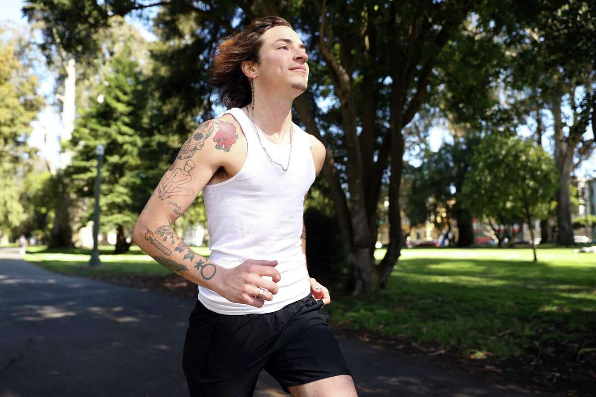 Cal Calamia runs along a path in San Francisco on Thursday. Calamia was awarded first-place at Sunday’s Bay to Breakers footrace in a new category recognizing nonbinary runners.