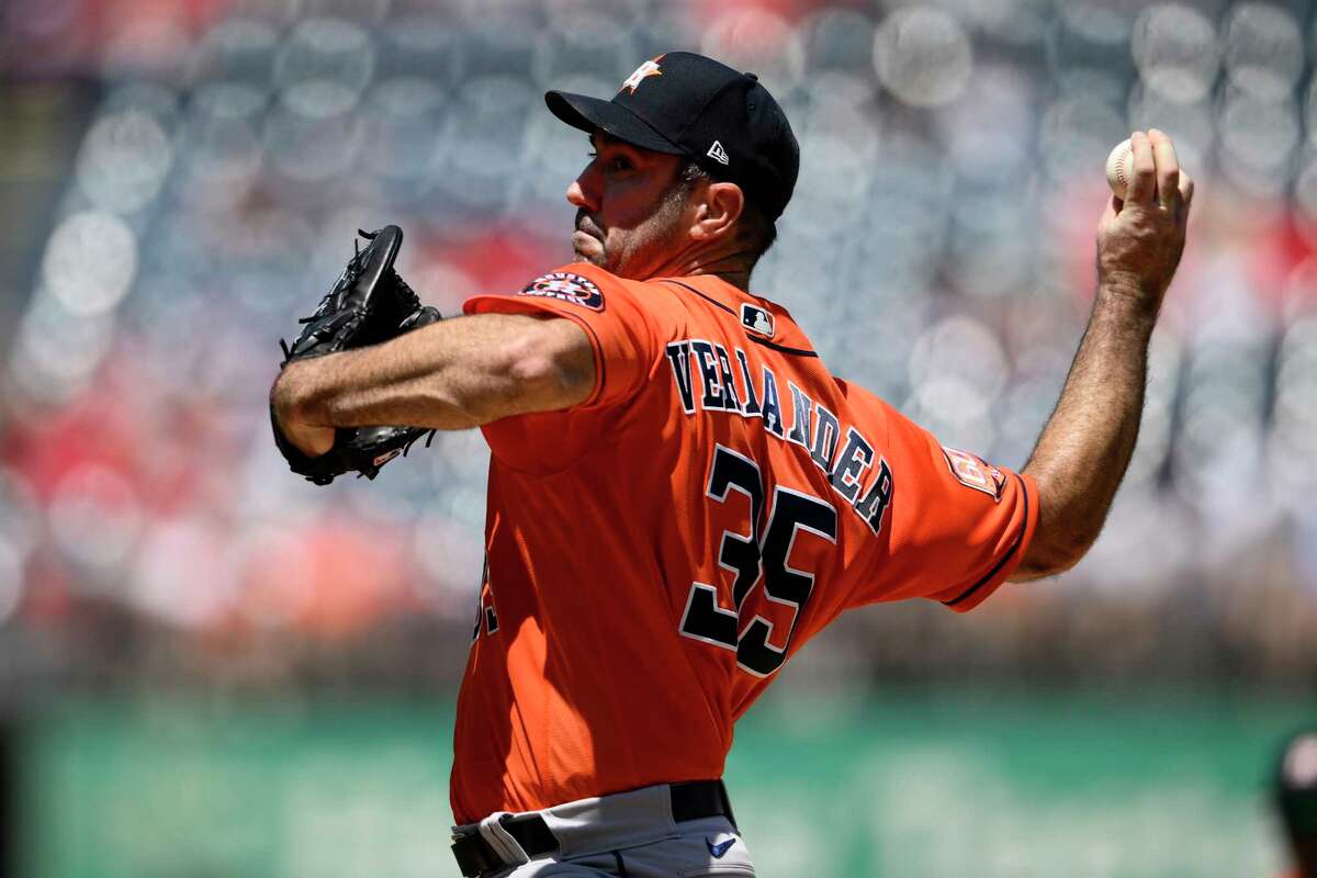 Houston Astros starting pitcher Justin Verlander delivers during the first inning of a baseball game against the Washington Nationals, Sunday, May 15, 2022, in Washington. (AP Photo/Nick Wass)