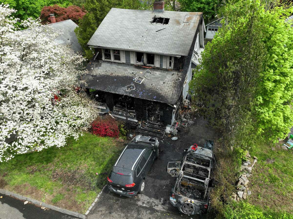 An incident report suggests a fatal May fire on Nelson Avenue was sparked in the home’s front porch, but notes the cause of the blaze remains undetermined.