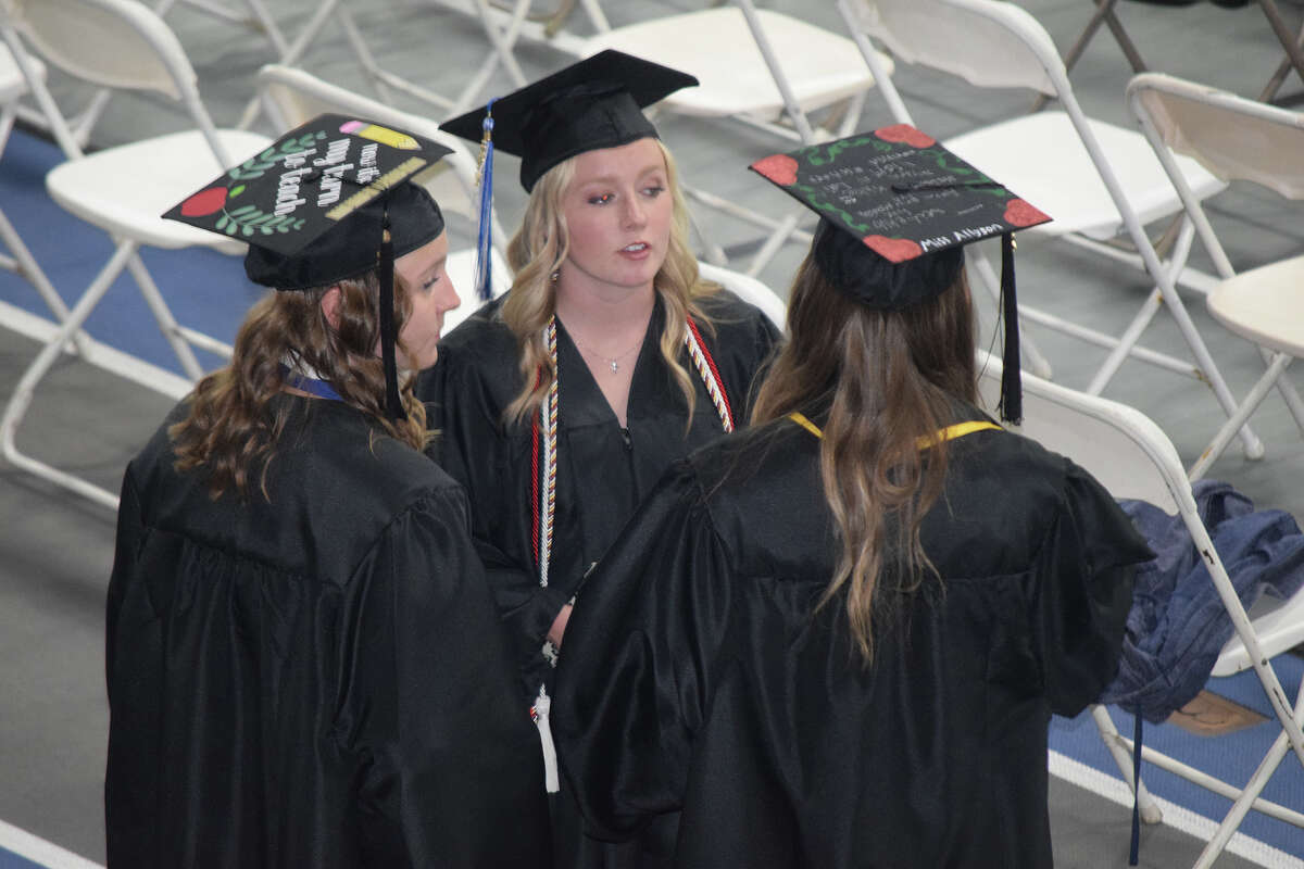 Illinois College students talk before the start of commencement ceremonies Sunday.