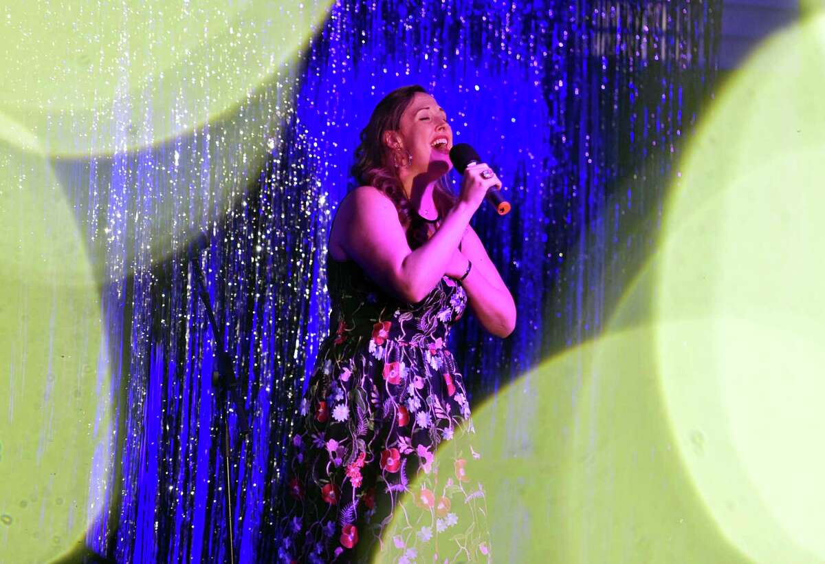 Rebecca Mason-Wygal sings Tammy Wynette’s “Stand By Your Man” during New Canaan Summer Theatre’s 19th annual gala at the New Canaan Country Club on Saturday.