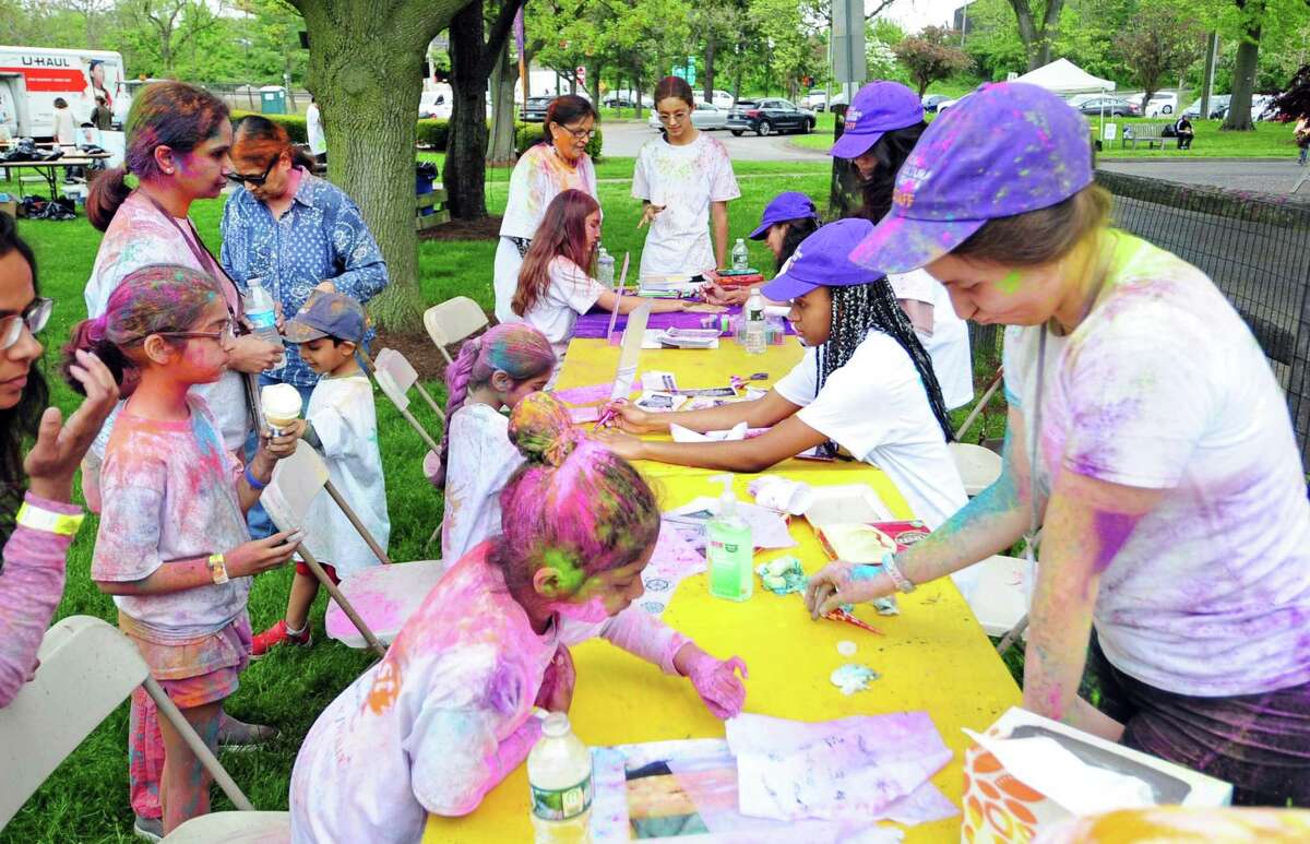 The India Cultural Center of Greenwich hosts its Holifest and Color Throw at Roger Sherman Baldwin Park in Greenwich, Conn., on Saturday May 14, 2022. Although the Color Throw is highlight of event, there were plenty of other activities like Indian food, arts and crafts, DJ Kunjun providing music, henna tattoos and an ice cream truck.
