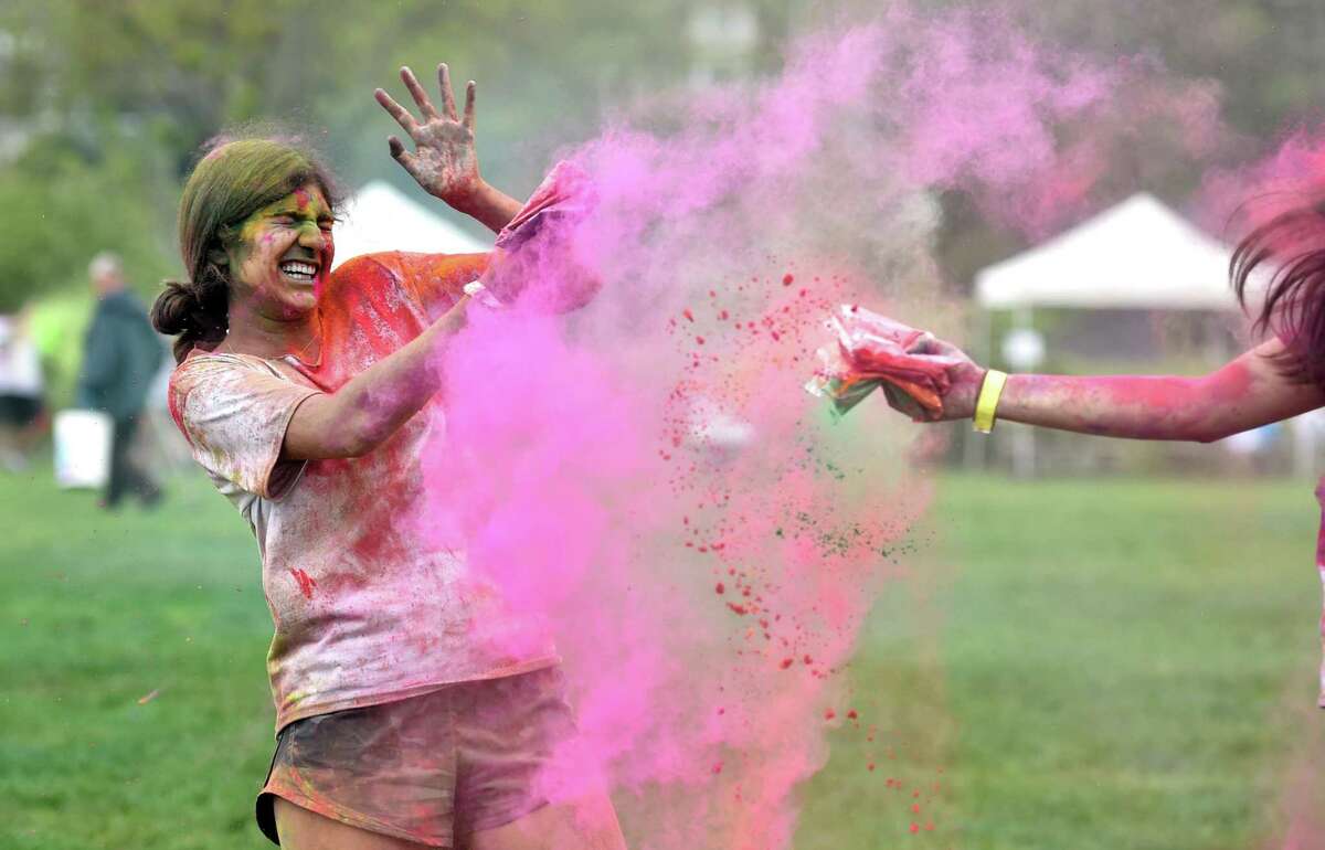 The India Cultural Center of Greenwich hosts its Holifest and Color Throw at Roger Sherman Baldwin Park in Greenwich, Conn., on Saturday May 14, 2022. Although the Color Throw is highlight of event, there were plenty of other activities like Indian food, arts and crafts, DJ Kunjun providing music, henna tattoos and an ice cream truck.