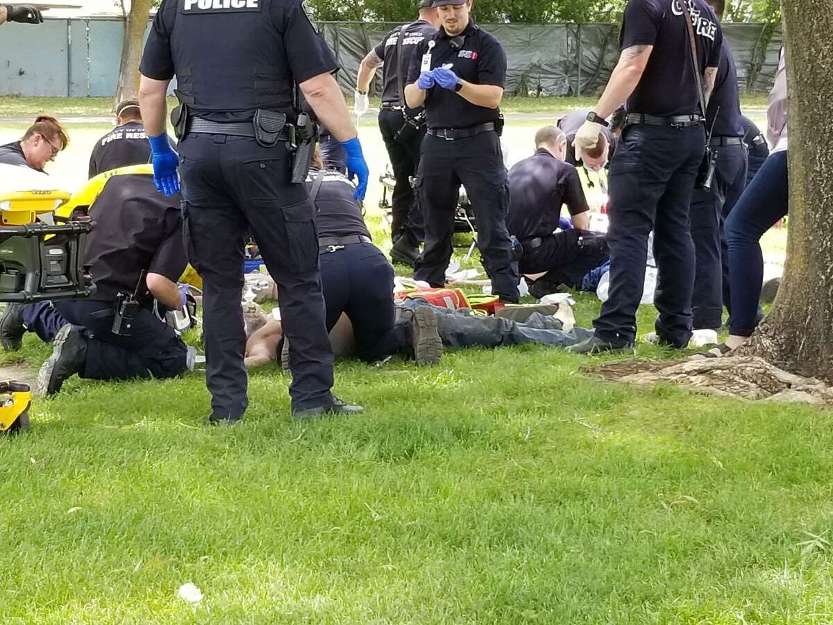First responders tend to men believed to have overdosed in Community Park in Chico.