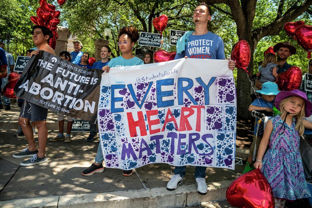 Pro-life protesters stand near the gate of the Texas state capitol at a protest outside the Texas state capitol on May 29, 2021 in Austin, Texas. 