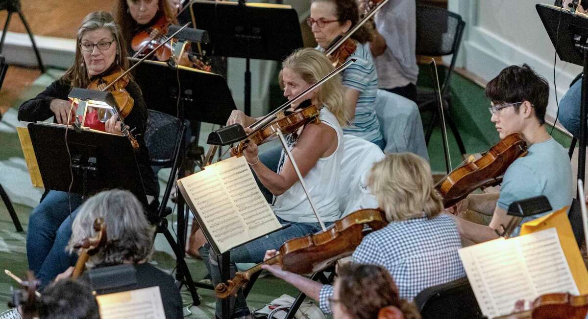 San Antonio Symphony musicians rehearse Wednesday, May 11, 2022 at First Baptist Church in downtown San Antonio as they prepare for a pair of concerts they are producing themselves. The San Antonio Symphony has canceled the remainder of the 2021-22 concert season.