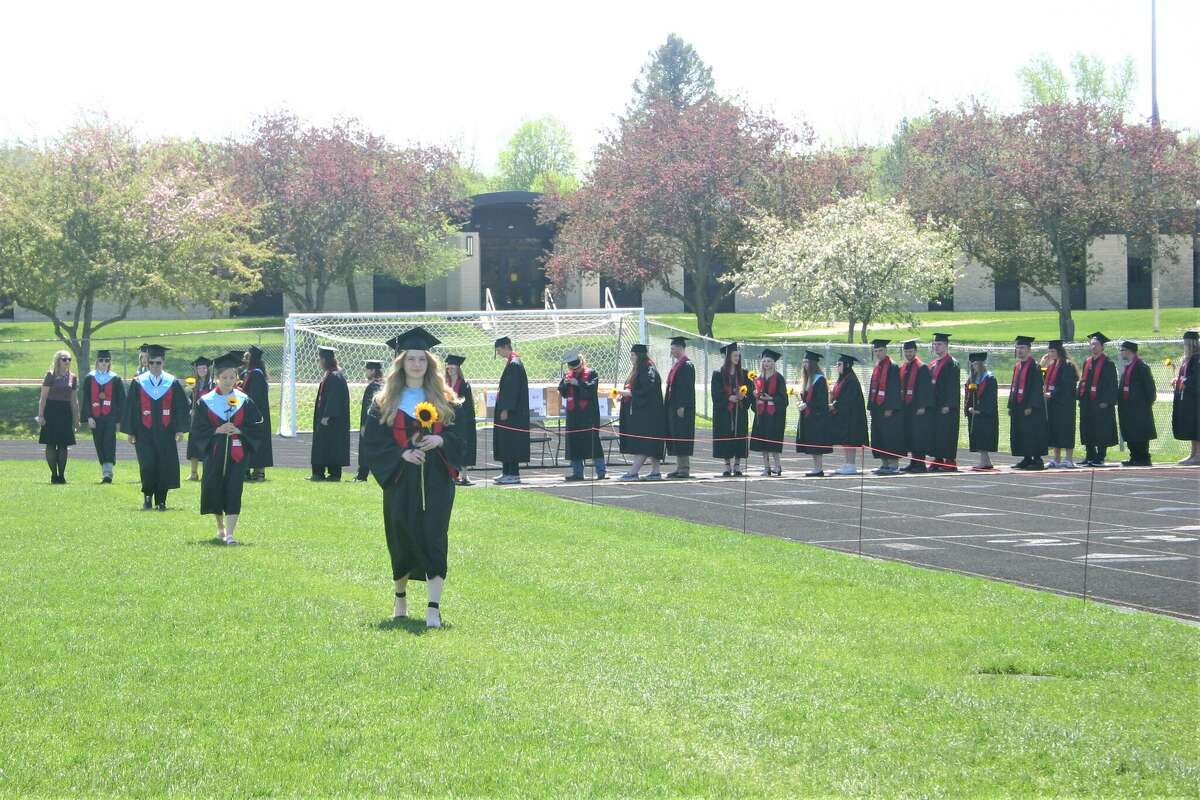 The Reed City High School 139th commencement ceremony was held on the RCHS football field on Sunday, May 15, with 95 graduating seniors walking across the stage. RCHS Distinguished Alumnus Award winner, James G. George, class of 1963 was the keynote speaker.