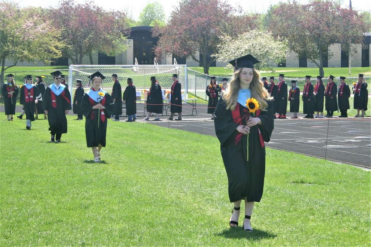 The Reed City High School 139th commencement ceremony was held on the RCHS football field on Sunday, May 15, with 95 graduating seniors walking across the stage. RCHS Distinguished Alumnus Award winner, James G. George, class of 1963 was the keynote speaker.
