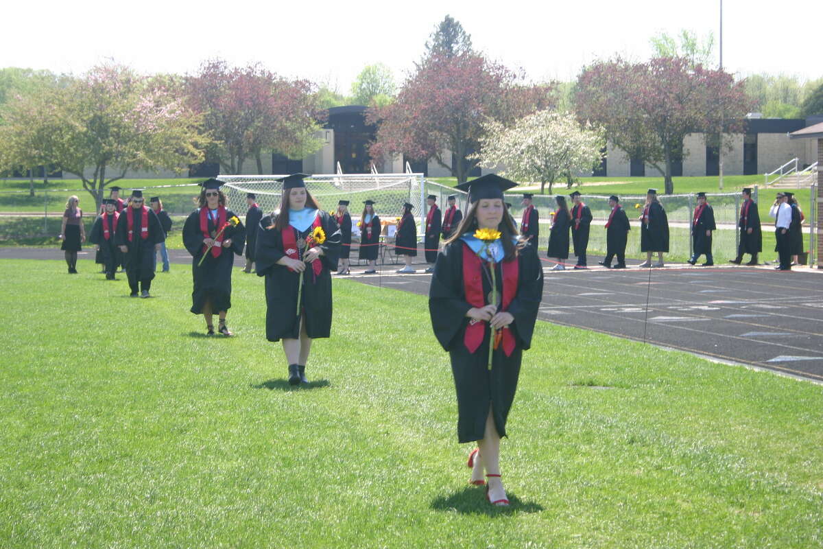 The Reed City High School 139th commencement ceremony was held on the RCHS football field on Sunday, May 15, with 95 graduating seniors walking across the stage. RCHS Distinguished Alumnus Award winner, James G. George, class of 1963 was the keynote speaker.