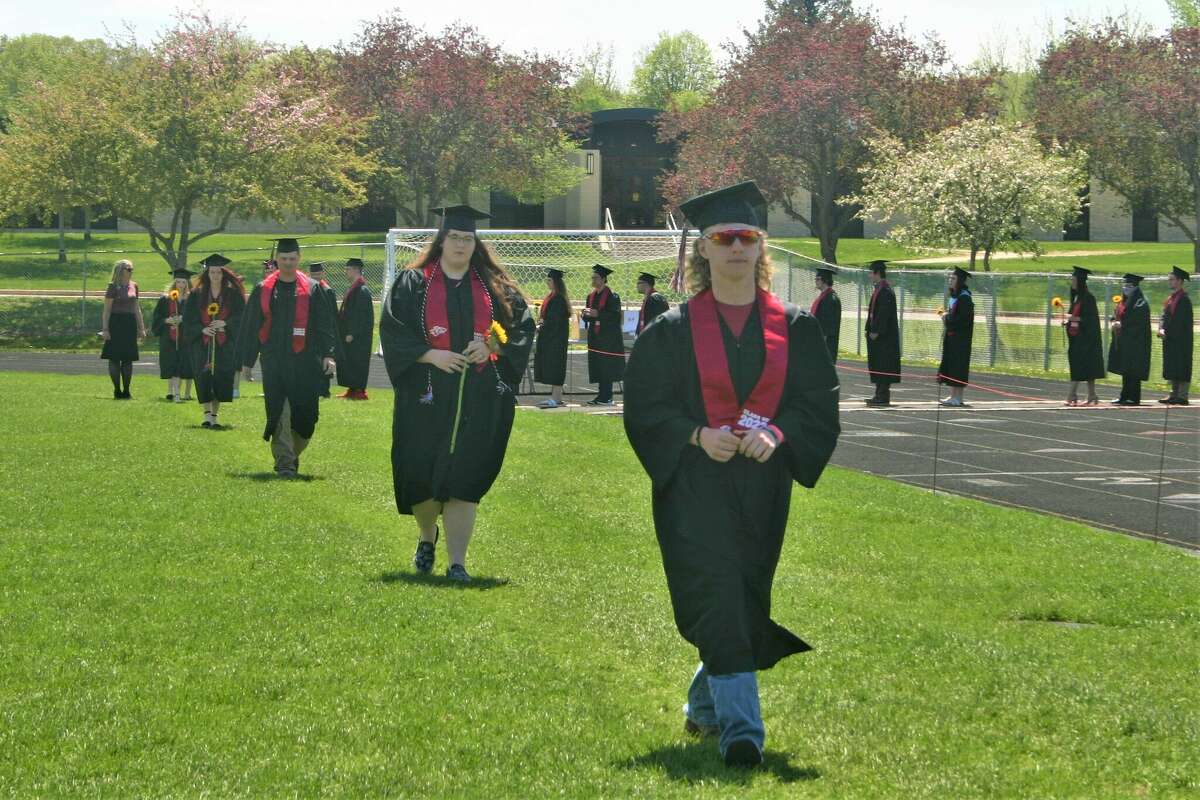 The Reed City High School 139th commencement ceremony was held on the RCHS football field on Sunday, May 15, with 95 graduating seniors walking across the stage. RCHS Distinguished Alumnus Award winner, James G. George, class of 1963 was the keynote speaker.