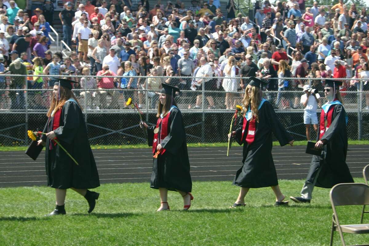 The Reed City High School 139th commencement ceremony was held on the RCHS football field Sunday, May 15, with 95 graduating seniors walking across the stage. RCHS Distinguished Alumnus Award winner, James G. George, class of 1963 was the keynote speaker.