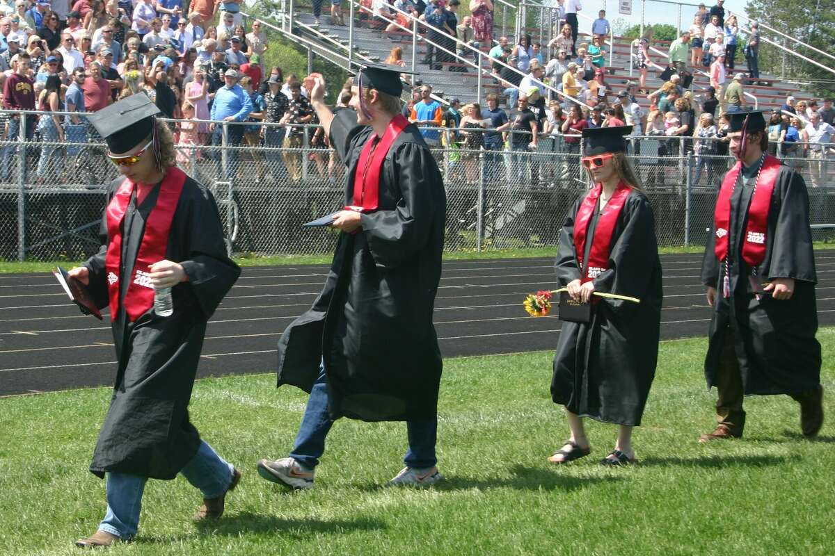 The Reed City High School 139th commencement ceremony was held on the RCHS football field Sunday, May 15, with 95 graduating seniors walking across the stage. RCHS Distinguished Alumnus Award winner, James G. George, class of 1963 was the keynote speaker.