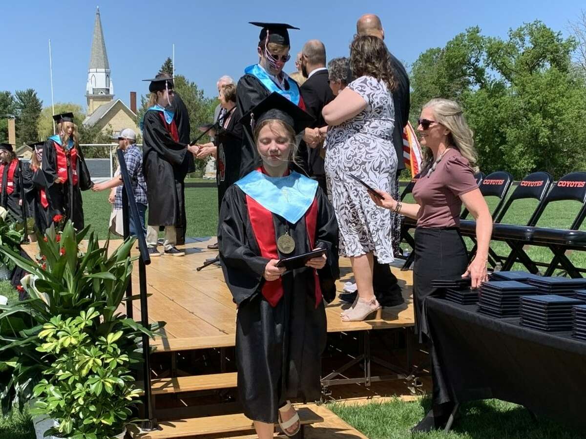 The Reed City High School 139th commencement ceremony was held on the RCHS football field on Sunday, May 15, with 95 graduating seniors walking across the stage. RCHS Distinguished Alumnus Award winner, James G. George, class of 1963 was the keynote speaker.