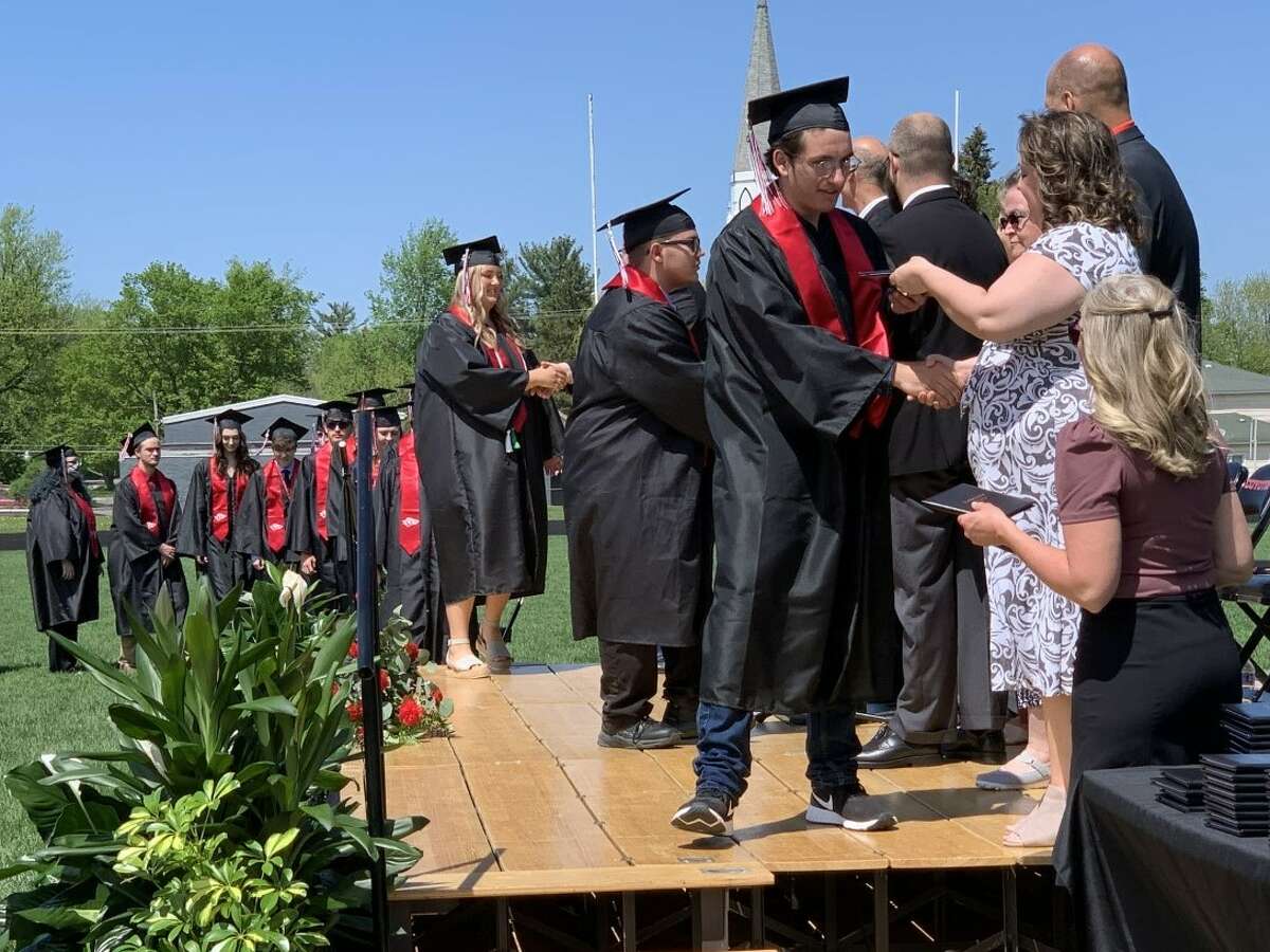 The Reed City High School 139th commencement ceremony was held on the RCHS football field Sunday, May 15, with 95 graduating seniors walking across the stage. RCHS Distinguished Alumnus Award winner, James G. George, class of 1963 was the keynote speaker.