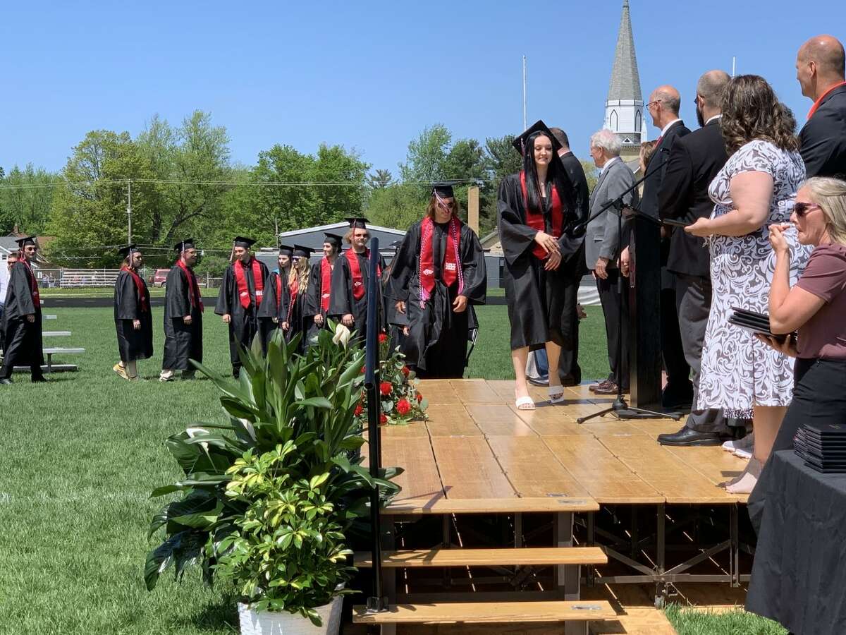 The Reed City High School 139th commencement ceremony was held on the RCHS football field Sunday, May 15, with 95 graduating seniors walking across the stage. RCHS Distinguished Alumnus Award winner, James G. George, class of 1963 was the keynote speaker.