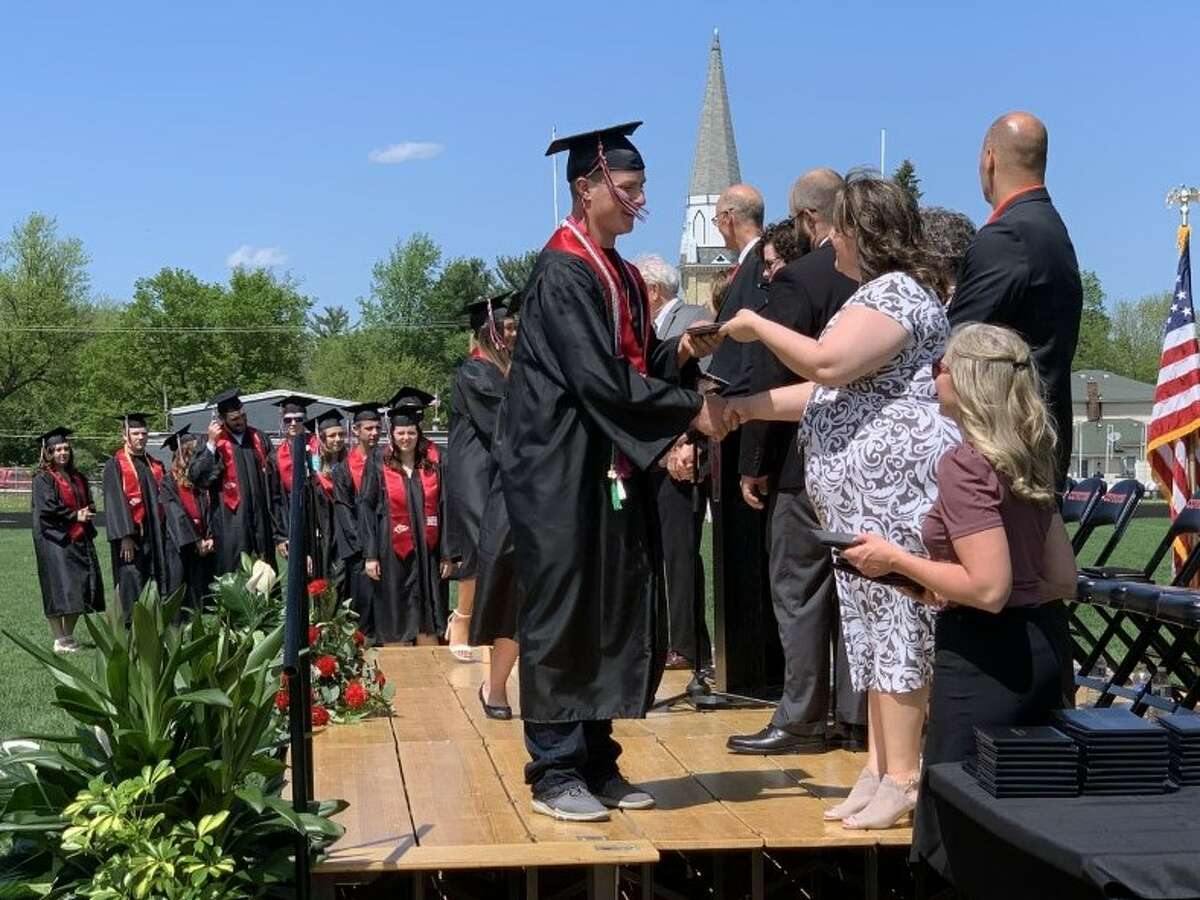 The Reed City High School 139th commencement ceremony was held on the RCHS football field Sunday, May 15, with 95 graduating seniors walking across the stage. RCHS Distinguished Alumnus Award winner, James G. George, class of 1963 was the keynote speaker.