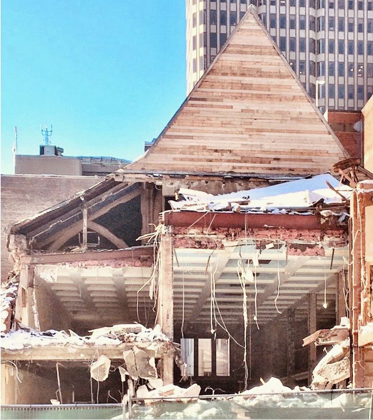 An image of the original St. Thomas Episcopal Church in New Haven being torn down. 