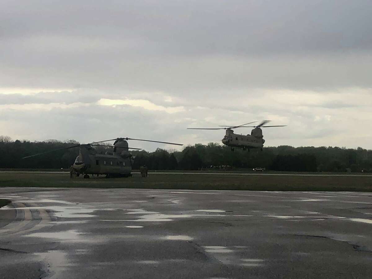 Two Chinook helicopters landed at Huron County Memorial Airport on Saturday night as part of a military exercise. They were supposed to land at Grindstone Air Strip, but the destination changed to Bad Axe due to bad weather.