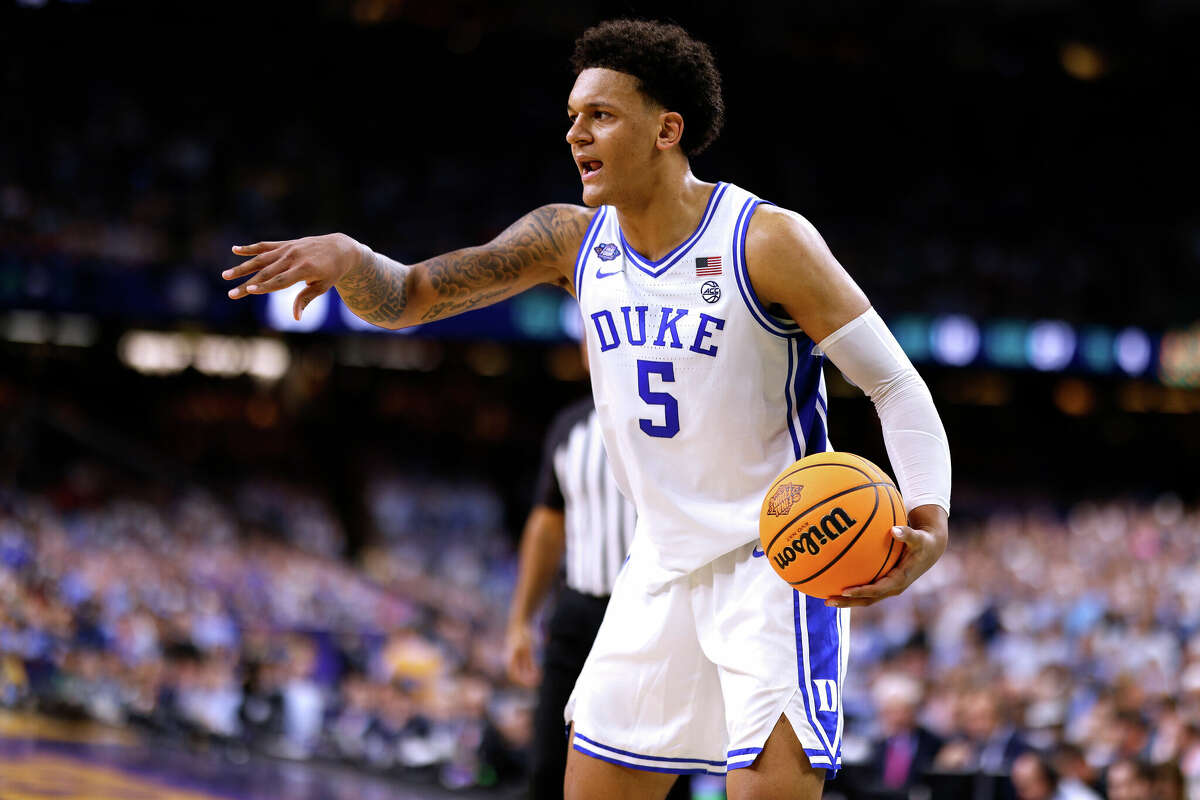 Paolo Banchero of the Duke Blue Devils signals a teammate against the North Carolina Tar Heels during the 2022 NCAA Men's Basketball Tournament Final Four semifinal at Caesars Superdome on April 2, 2022 in New Orleans, Louisiana.