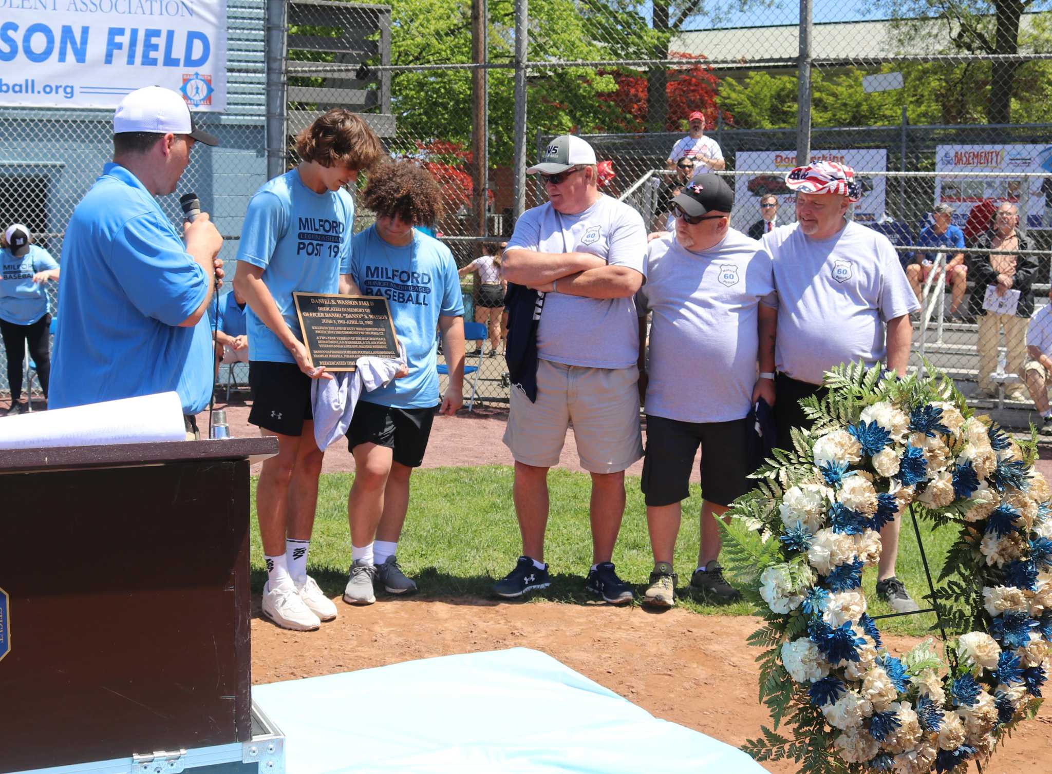 Milford honors Wasson's memory, rededicates field named for him - Vimarsana News
