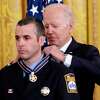 President Joe Biden awards Stamford Firefighter John Colandro the Public Safety Officer Medal of Valor in the East Room of the White House.