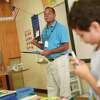 John Corcoran teaches on the first day of the school year at Northeast School in Stamford in 2015. Corcoran, now a sixth grade math teacher at Turn of River Middle School, was recently elected to head the district’s teachers union.