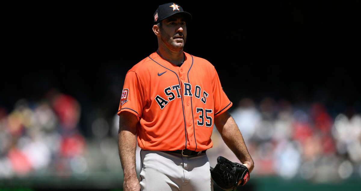 Houston Astros starting pitcher Justin Verlander stands on the mound during a baseball game against the Washington Nationals, Sunday, May 15, 2022, in Washington. (AP Photo/Nick Wass)